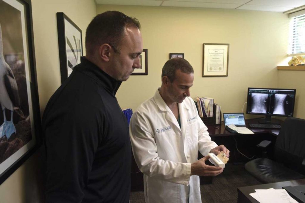 Danbury doctor completes groundbreaking back surgery, first in CT Barricaid
